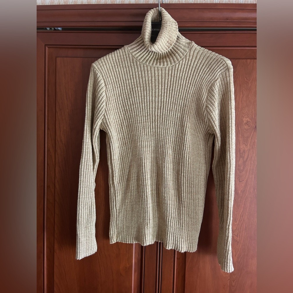 Add a little shimmer to your wardrobe! Can be worn alone or layered.